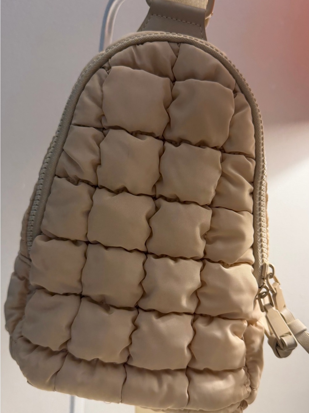 Urban fit by Urban Expressions puffer sling bag.